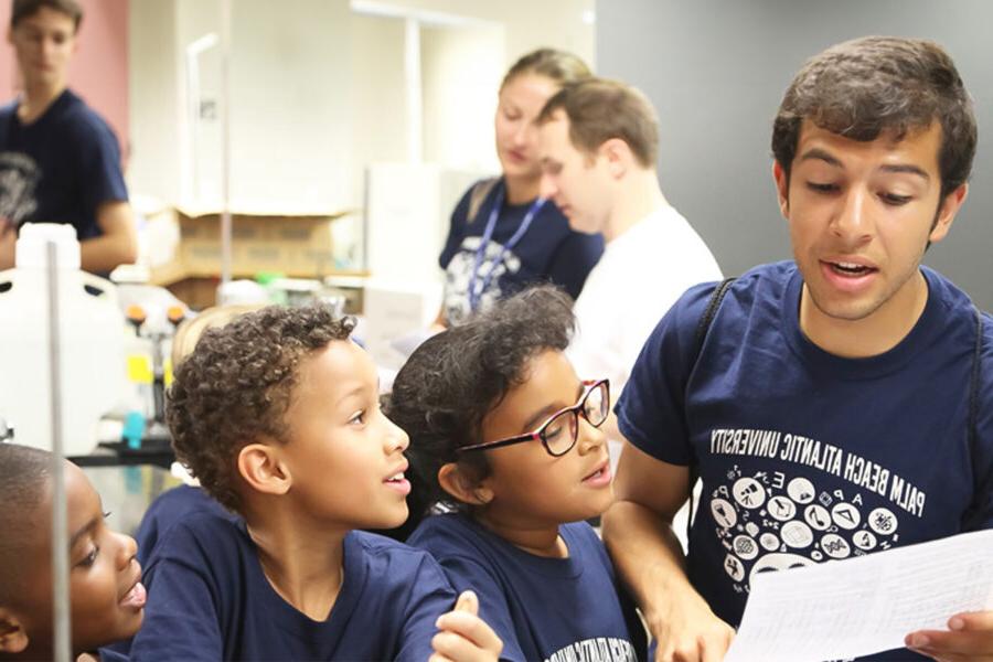 Students participate in an elementary education children's event.